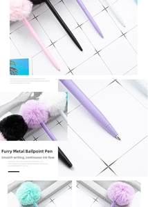 Detail showing colorful plush pom pom metal ballpoint pens in various pastel shades