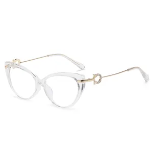 Cat-eye transparent glasses frame with gold metal temples and diamond accents