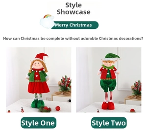 Detail showing two festive plush elf dolls with red and green outfits and striped legs