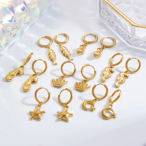 Chic 18k gold plated ocean style earrings set featuring sea life charms on white background