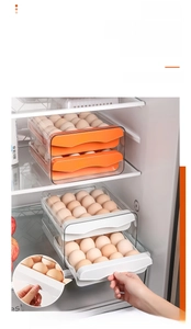 Macro view of double-layer transparent egg storage box with sliding tracks for refrigerator