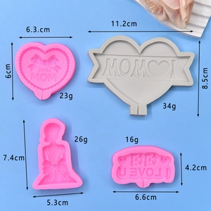 Set of 4 Mother's Day heart silicone molds with MOM and LOVE designs on blue background