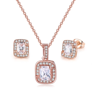 Detailed macro view of geometric square zircon jewelry set in rose gold finish