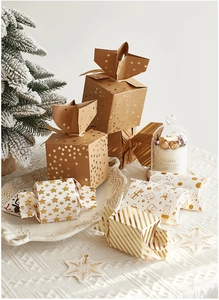 Christmas kraft gift boxes with gold foil stars and stripes for festive packaging