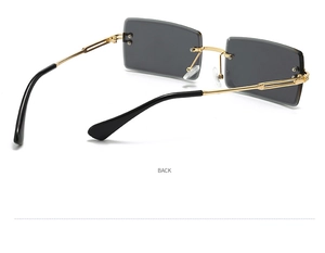 Rear view detail of rimless rectangular sunglasses with gold metal temples