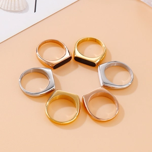 Minimalist oval stainless steel rings in gold, rose gold, and silver with resin inlay
