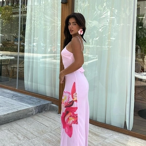 Pink backless halter maxi dress with floral orchid print and glossy silk finish