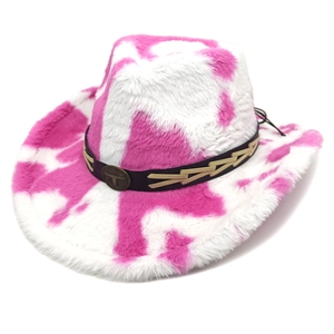 Pink and white cow print plush cowboy hat with vintage metal bull head accessory