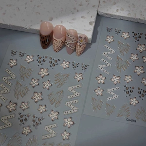 Detailed view of Co-569 pink leopard and floral nail art stickers on long fake nails