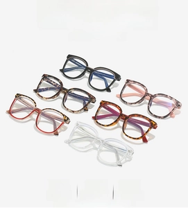 Detail view of six TR90 square frame glasses in various colors and tortoiseshell patterns