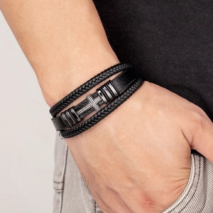 Multilayer leather bracelet with cross metal clasp and zircon inlays on male wrist