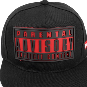Detail of flat brim baseball cap with 3D rubber Parental Advisory logo patch