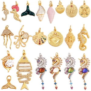 Lot de 18 pendentifs marins or et argent avec breloques hippocampe et étoile de mer