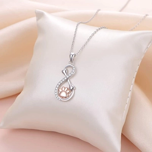Collana infinity in argento S925 con ciondolo a zampa in oro rosa e osso su seta