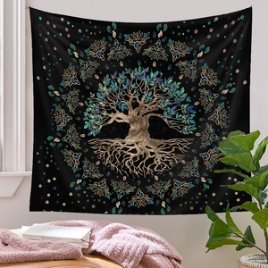Detail of Tree of Life tapestry with golden roots and Celtic patterns on indoor wall