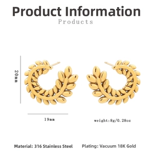 Macro detail of 18K gold plated stainless steel wheat leaf C-shaped hoop earrings