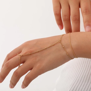 Elegant gold-tone stainless steel finger bracelet with minimalist double chain design