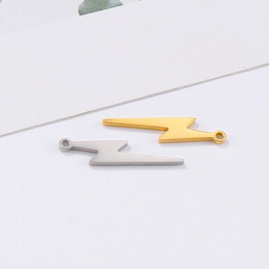 Detailed view of lightning bolt charms in gold and silver finish for DIY jewelry