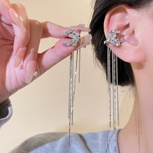 Elegant silver star and moon tassel earrings with sparkling rhinestones for women