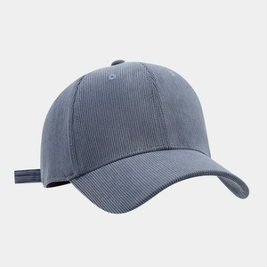 Detail of grey corduroy baseball cap showing fine vertical texture and 6-panel structure