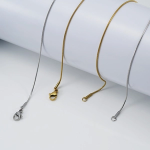 Cadenas de serpiente en acero inoxidable oro de 18K y plata con cierres de langosta