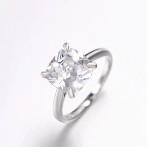 Elegant cushion-cut zirconia engagement ring with a classic four-prong silver metal setting