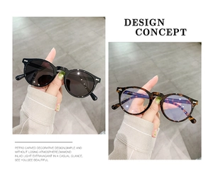 Nahaufnahme der Retro-Rundbrille mit fein gravierten Metallbügeln und Nieten