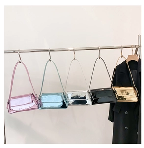 Glossy baguette bags in five colors hanging with a suit for trendy styling