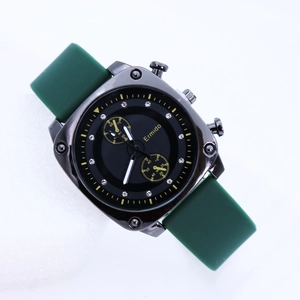Square black quartz watch with green silicone strap and crystal hour markers