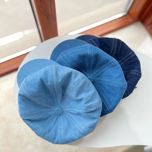 British retro denim newsboy cap for women in light blue, medium blue, and dark blue