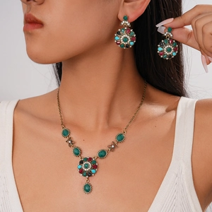 Vintage jewelry set with crystal flower necklace and earrings on a professional model