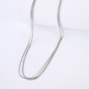 Layered silver stainless steel necklace for women with a minimalist multi-row design