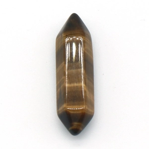 Polished tiger eye gemstone double pointed hexagonal crystal column on white background