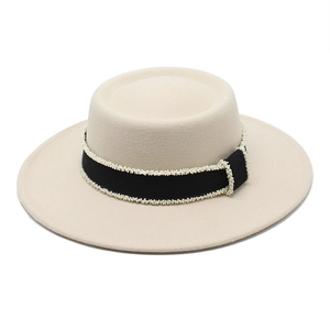 Elegant cream wool felt boater hat featuring a black grosgrain ribbon with white bead trim