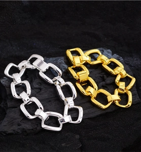Detailed macro shot of chunky geometric chain bracelet with S925 engraving on clasp