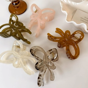 Hollow butterfly hair claws in jelly colors and creamy resin finishes for women
