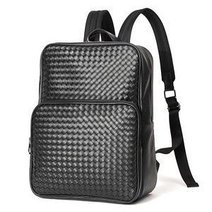 Men's black woven leather backpack for business and leisure shown at a 45-degree angle
