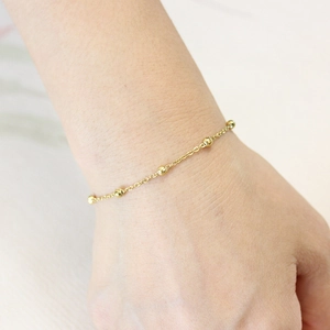 Waterproof gold stainless steel beaded chain bracelet for women on wrist wear