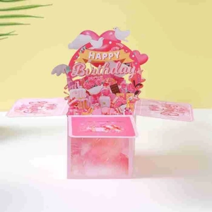 3D pop-up birthday card box with pink floral design, white doves and heart cutouts