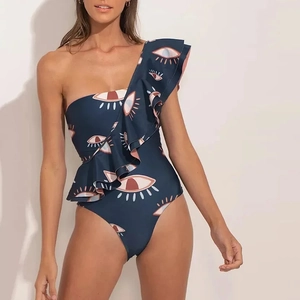 Detail of one-shoulder ruffles and evil eye print on navy blue swimsuit for women