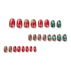 Christmas press-on nails featuring red and green plaid patterns with white snowflakes