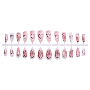 Pink and white gradient press-on nails with 24 pieces featuring bows and heart patterns