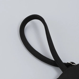 Detail of adjustable black elastic strap with metal ring on knitted crop top set