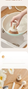 Detail of ecoco dish brush set showing arc design and dense bristles in kitchen setting