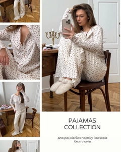 Detailed view of floral long sleeve pajama set with pink buttons and wavy cuffs