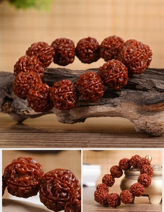 Macro shot of natural deep-textured Rudraksha seed beads with rich brownish-red polish