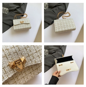 Detail view of white tweed crossbody bag with gold chain and metal lock closure
