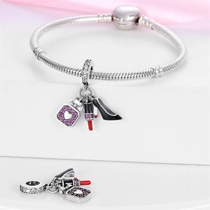 Silver bracelet with charms featuring high heels, lipstick and perfume bottle pendant