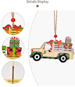 Detail view of wooden Christmas truck ornament showing rope, print, and thickness