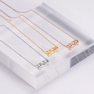 Set of 520 heart-shaped pendant necklaces with cubic zirconia in gold and silver finishes